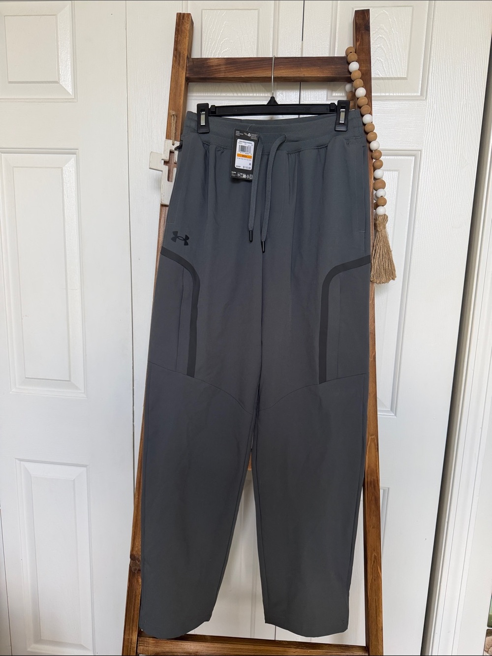 NWT. Under Armour Men's Dark Gray Tech Joggers with Drawstring. Cargo pant.